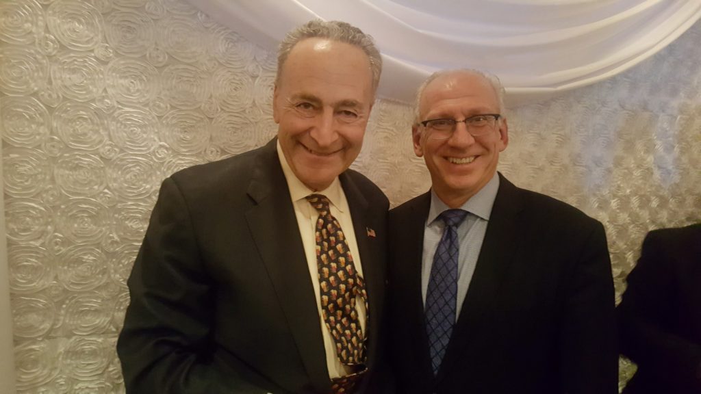 Davidoff Hutcher and Citron attorney Arthur Goldstein with Chuck Schumer